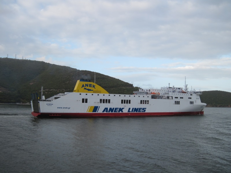 Anek Lines' ferry leaves the Igoumenitsa port in Greece, sailing to some Ionian, Adriatic, or Mediterranean destination.