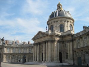 Institut de France, Paris, is among photogenic landmarks along the Seine River and the headquarters of several academies.