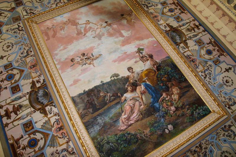 Four Seasons painting, decorating the ceiling of Achilleion's reception room, introduces different periods of the year.