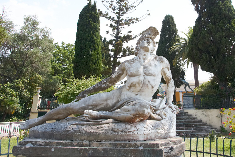 The Wounded Achilles, a masterpiece of Achilleion Palace, portrays the Trojan War hero trying to pull an arrow from his heel.