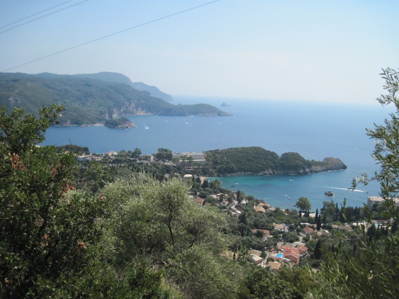 Paleokastritsa, a top tourist resort of Corfu, seen from Lakones, a village that sits on a steep slope of a nearby hill.