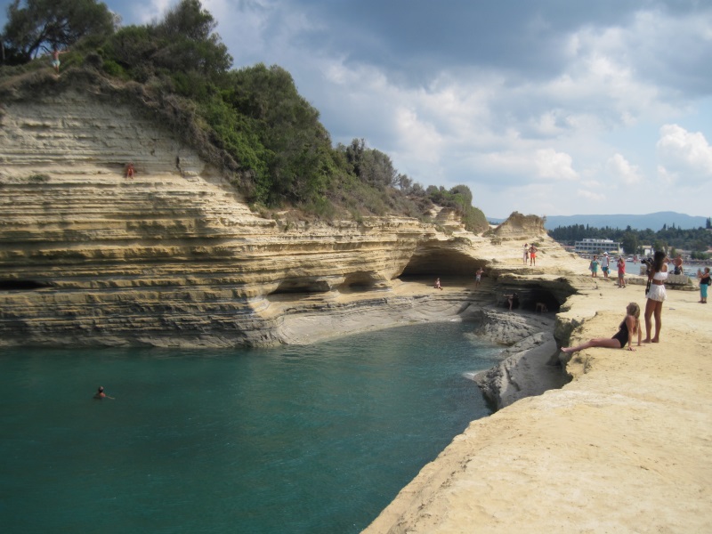 Canal d'Amour, featuring sculpted sandstone rocks, is a unique natural tourist attraction of Corfu and the Mediterranean.