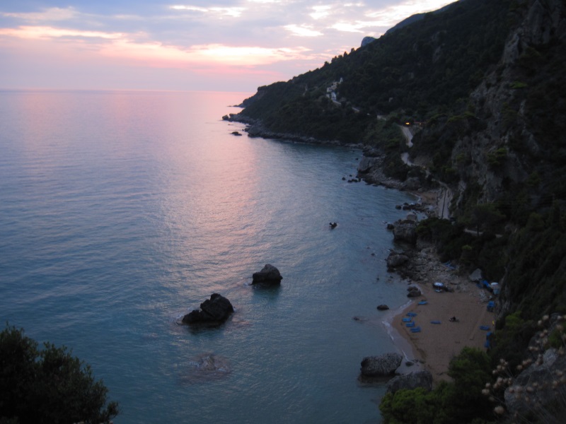 Myrtiotissa, located north of Glyfada, is a narrow, pristine beach that looks sublime as the sun goes below the horizon.