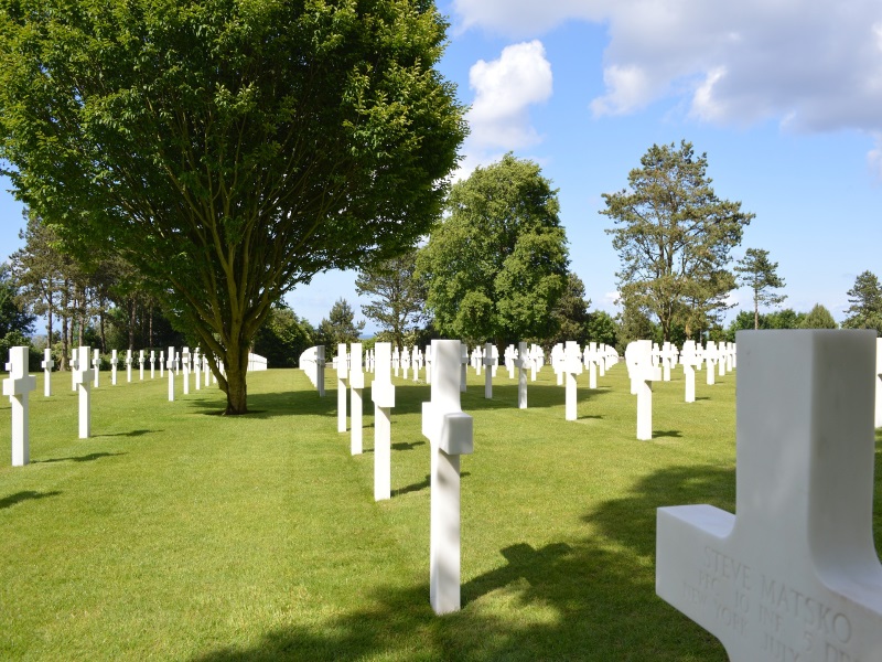 American Cemetery near Omaha Beach in Normandy featuring milk-white crosses is a top point of interest related to the D-Day.