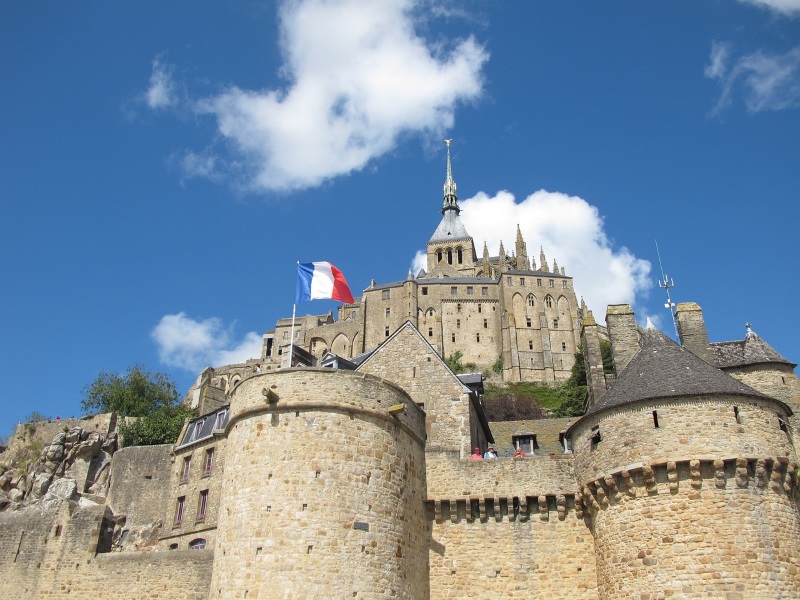 Visiting Mont Saint Michel, a tiny island occupied by an abbey and a town, is a top thing to do in France for tourists.
