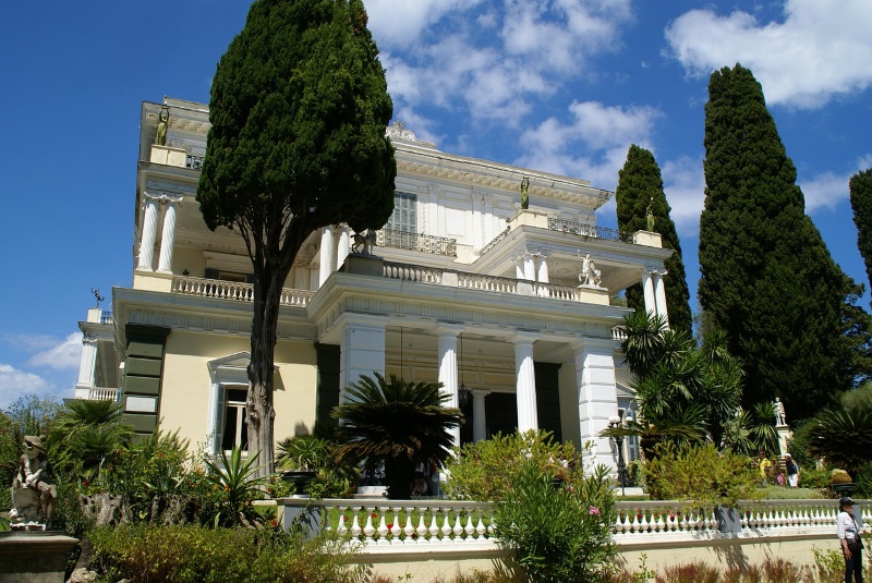 Achilleion Palace, one of the top Corfu tourist attractions, is a neoclassical museum with a gleaming façade set in gardens.