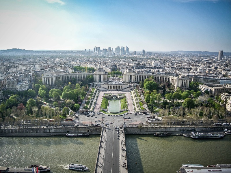 View of the Seine, Trocadero (just across the river), and La Defense district (in the distance) from the Eiffel Tower, Paris.