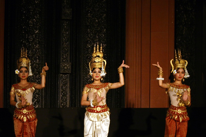 Apsara dancers, wearing stylish costumes and various shiny jewelry, perform the Khmer-style dance, known as Cambodian ballet.