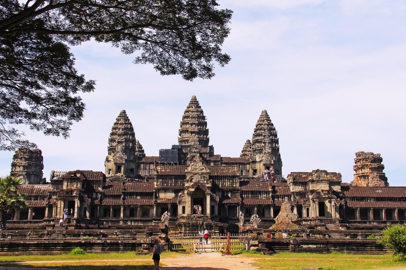 Angkor Wat, featured on the Cambodian flag, is a national symbol and one of the top tourist attractions throughout Asia.