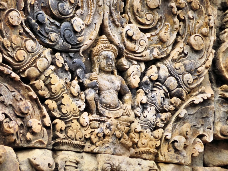 Relishing highly-detailed ornamentation of Banteay Srei Temple near Siem Reap is one of the top things to do in Cambodia.