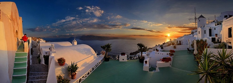 Watching the sunset from Oia Village in the northwestern corner of Santorini Island is among the top things to do in Greece.