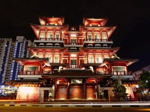 Featuring large windows, Buddha Tooth Relic Temple in Chinatown, Singapore, is an architectural gem made of timber and stone.