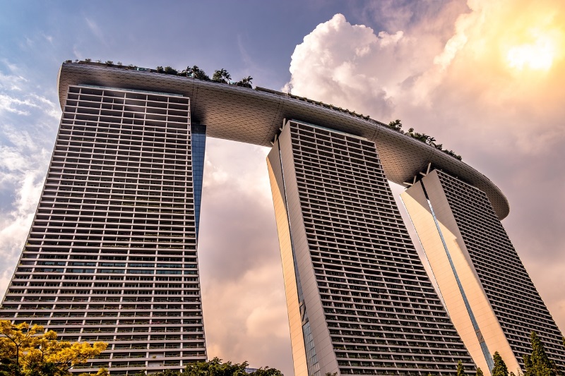 5-star Marina Bay Sands Hotel consists of three 57-story towers, a viewing platform connecting them, and a commercial zone.