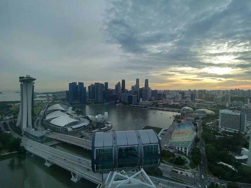 View of Marina Bay, Marina Bay Sands Hotel, ArtScience Museum, and CBD skyscrapers from the Singapore Flyer Ferris Wheel.